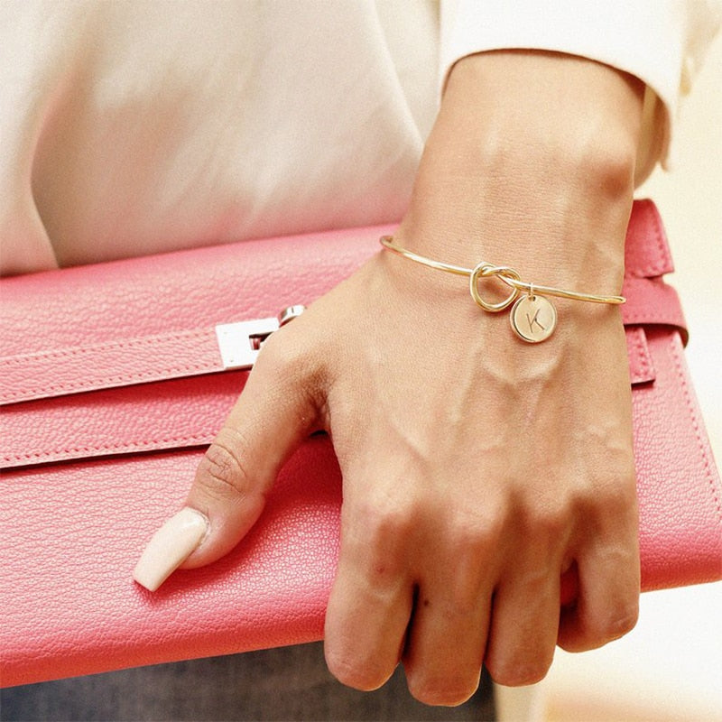 Rose gold / silver Charm bracelet / Knot Design